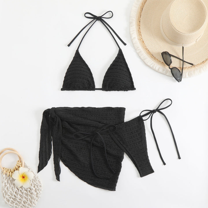 Dame trekant-bikini med volandetaljer og modern sarong-udseende Skovae