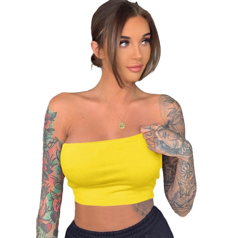 Dame bandeau-top i elastisk materiale med figurskabende snit Skovae