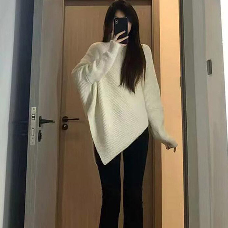 Kvinders oversized strikpullover med asymmetrisk snit og fin ribstruktur Stilla