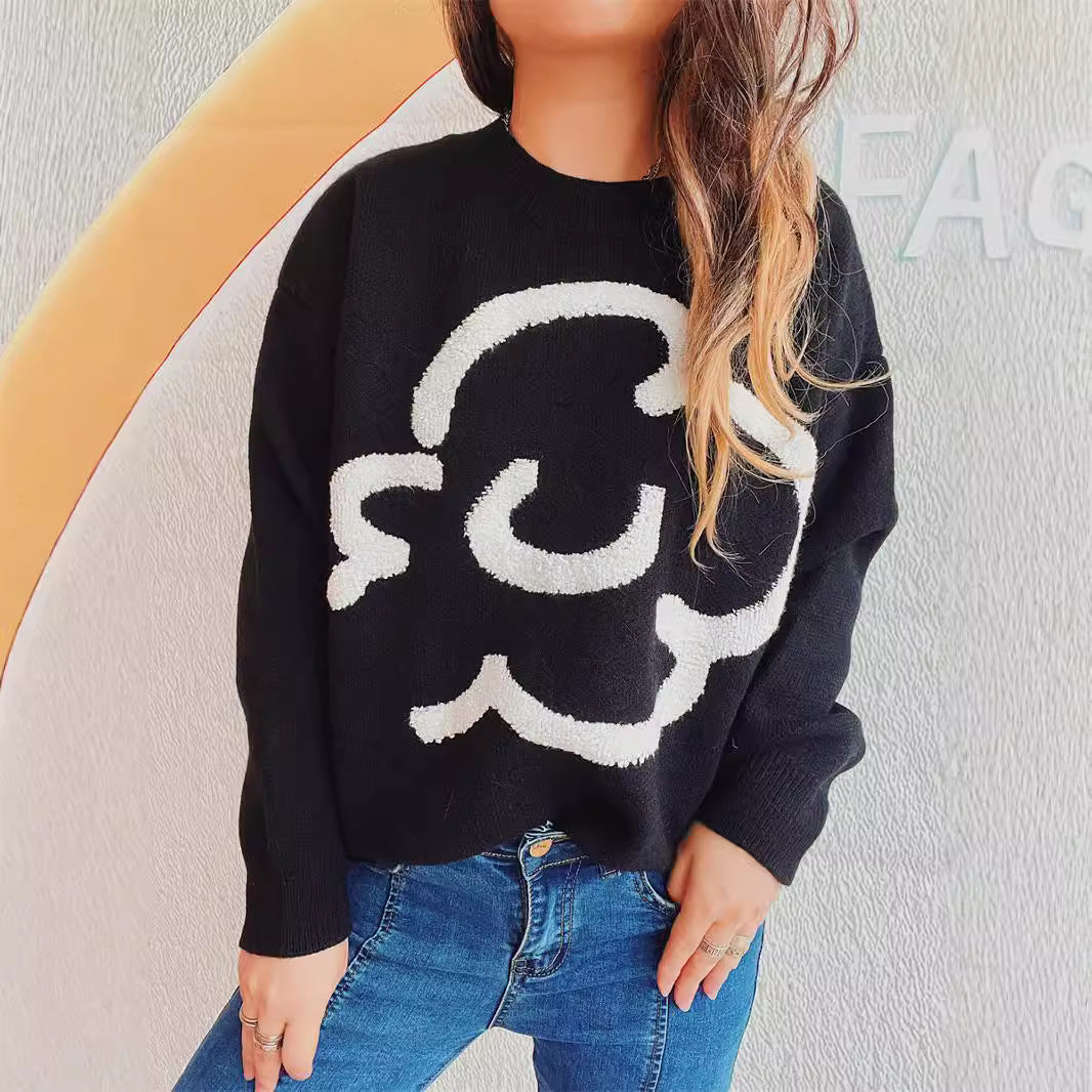 Kvindernes løse sweater med grafisk skrift Stilla