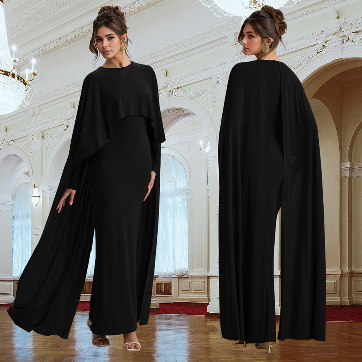 Dame elegant maxikjole med flydende capesnit og langærmet design Stilla
