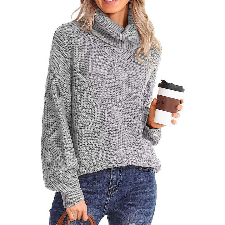 Kvinders strikkede sweater med høj krave og struktureret stingudseende Stilla