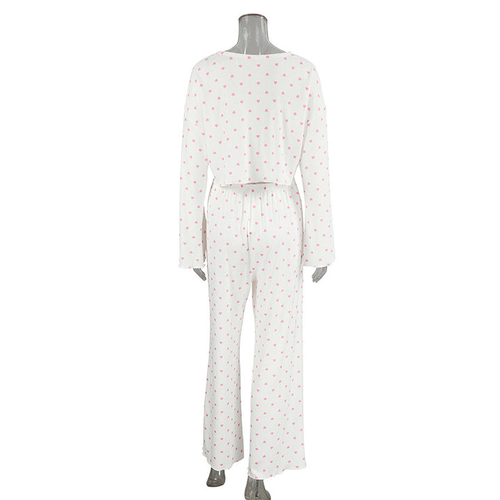 Dame luksuriøst pyjamas-sæt med stribet top og behagelige loose-fit bukser Stilla