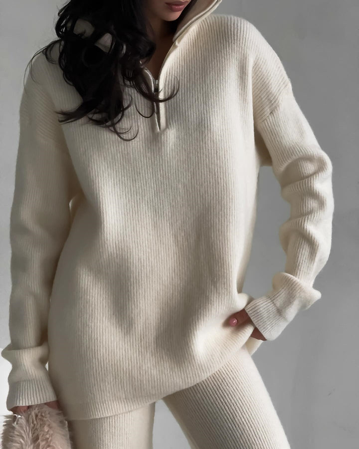 Kvinders komfortable strikket pullover med halv lynlås og ribbet design Skovae