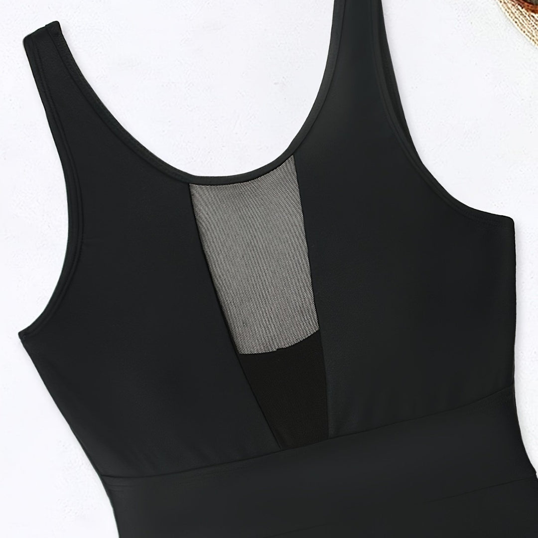 Dame Sporty One-Piece med dyb V-hals og transparente mesh-detaljer Skovae