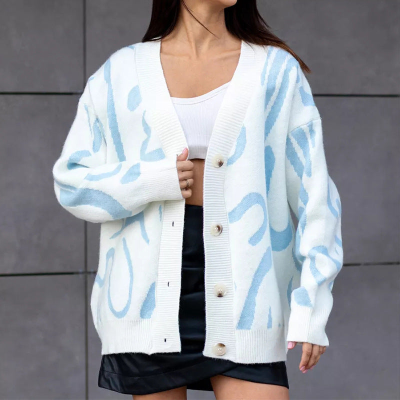 Dame cardigan med moderne mønster og elegante knapper