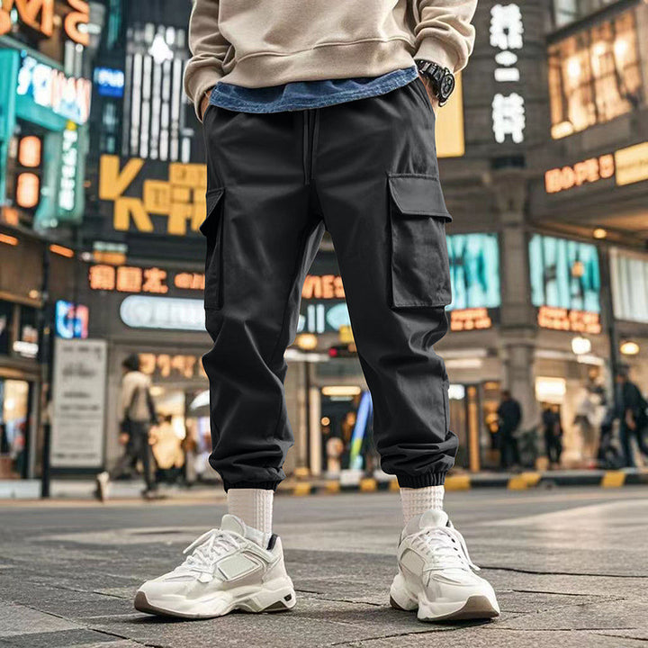 Herren nan urbane utilitariske joggere med multifunktionslommer og konisk ben Skovae
