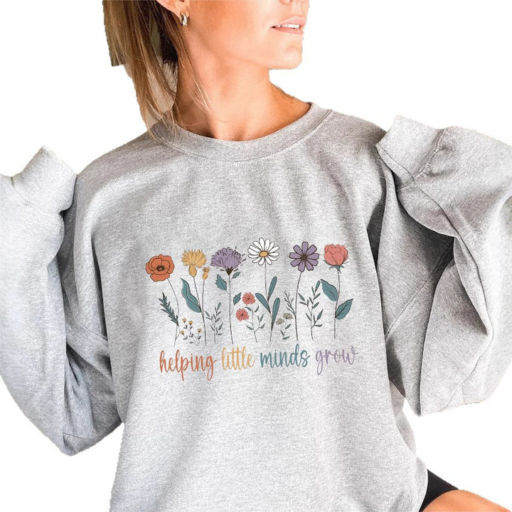 Kvinders sweatshirt med voluminøse ærmer og motiverende blomsterprint Stilla