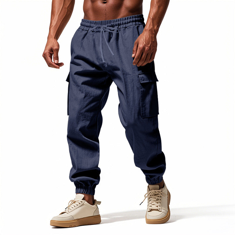 Herrer nan konisk skrånende joggere i utilitarisk stil med elastisk talje, snøre og klaplommer Skovae
