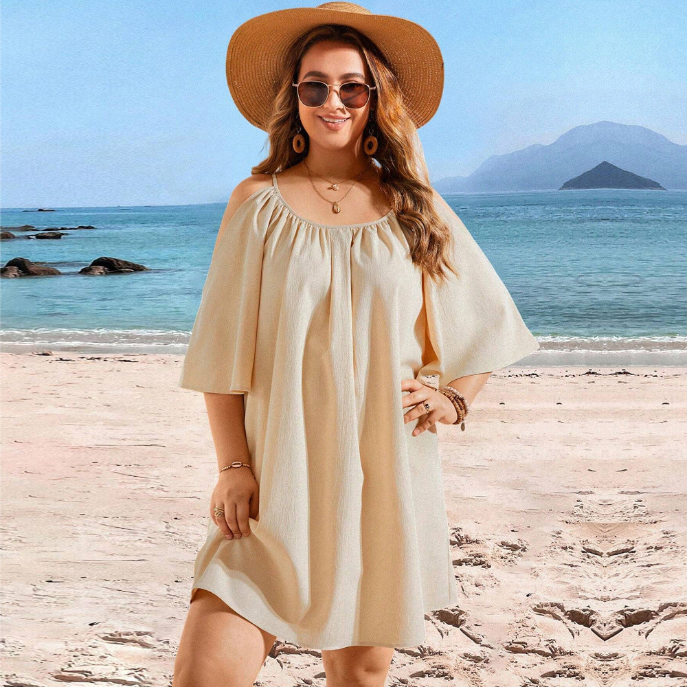 Dame let strandkjole med off-shoulder design og brede ærmer Stilla