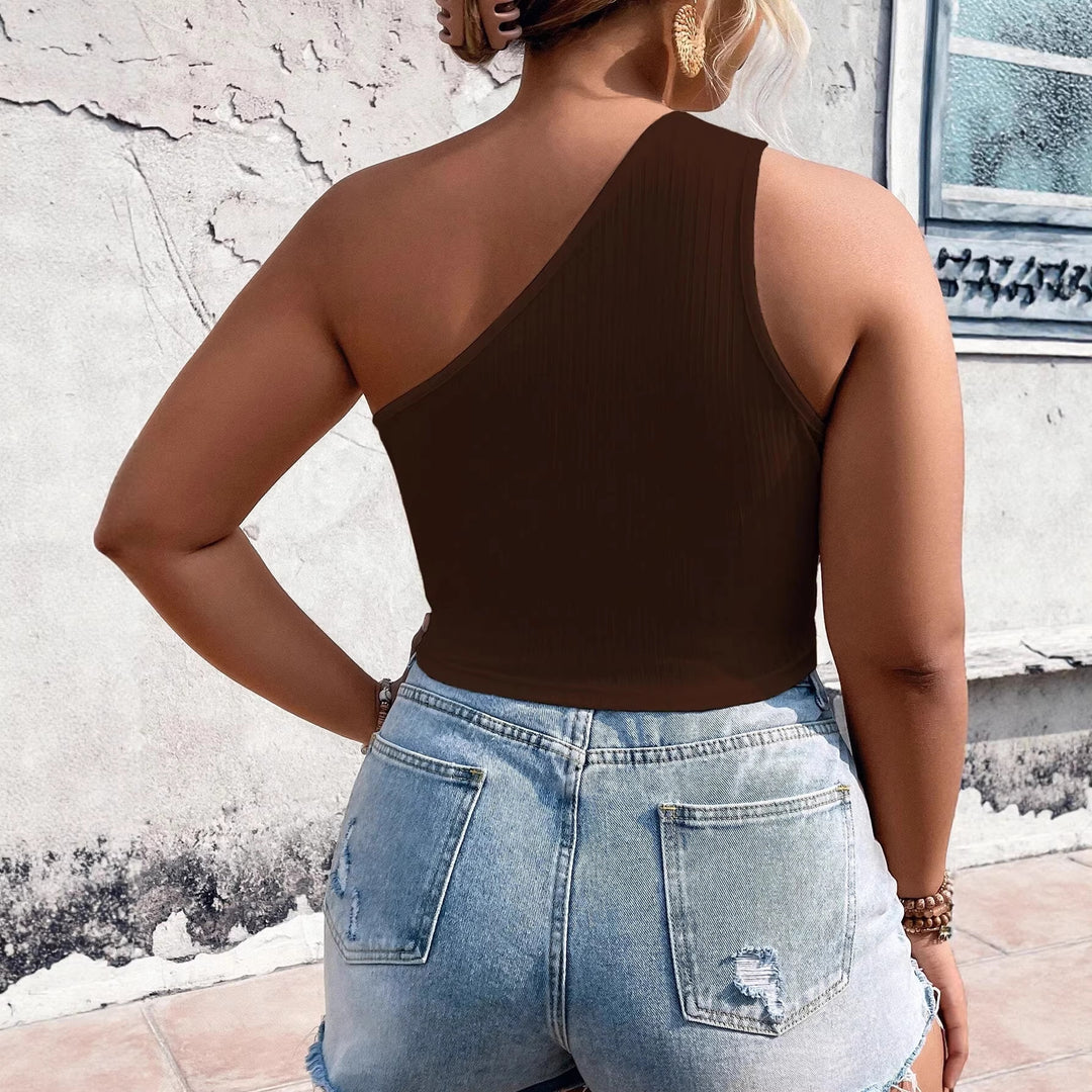Dame Crop-top med asymmetrisk snit og cut-out-detaljer Skovae