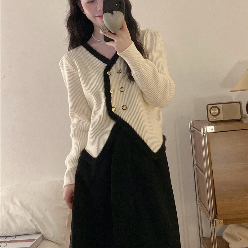 Kvindernes elegante cardigan med kontrastkant og knapdetaljer Stilla