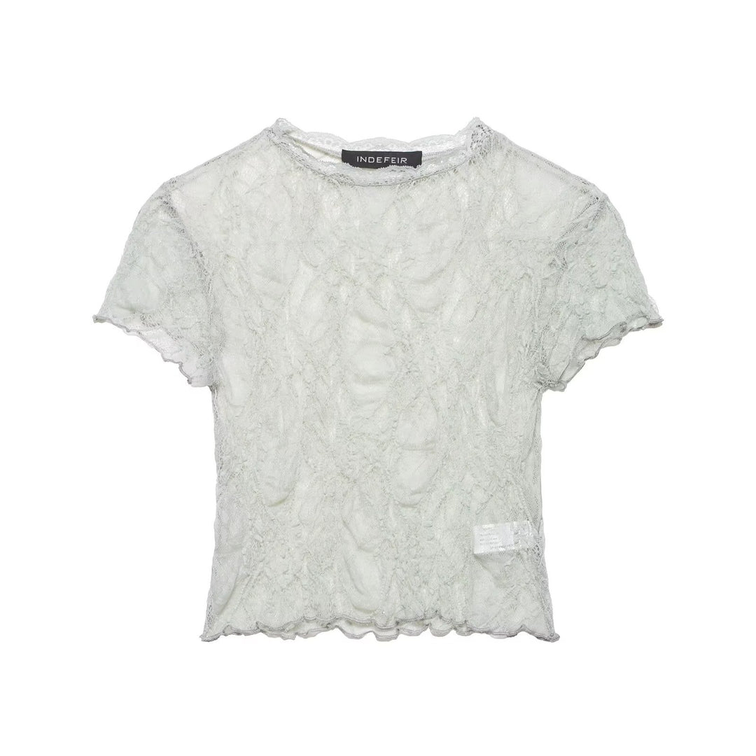Dame spids crop-top med fin struktur og voluminøse ærmer Skovae