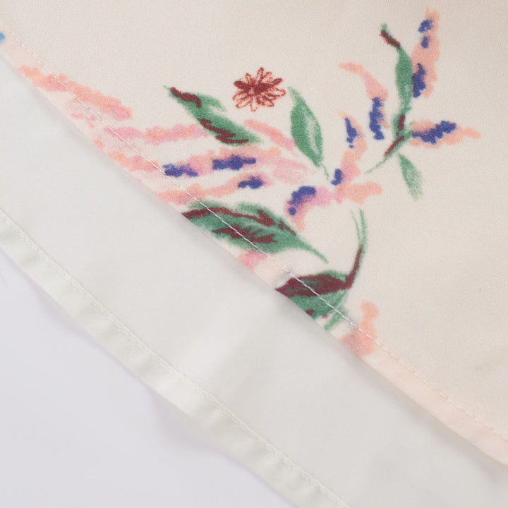 Dame Maxikjole med muntert blomsterprint og feminine flæsedetaljer Stilla