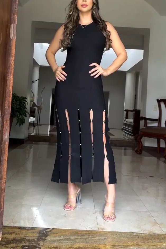 Dame maxikjole med sidelæns cut-outs og elegant slids Stilla