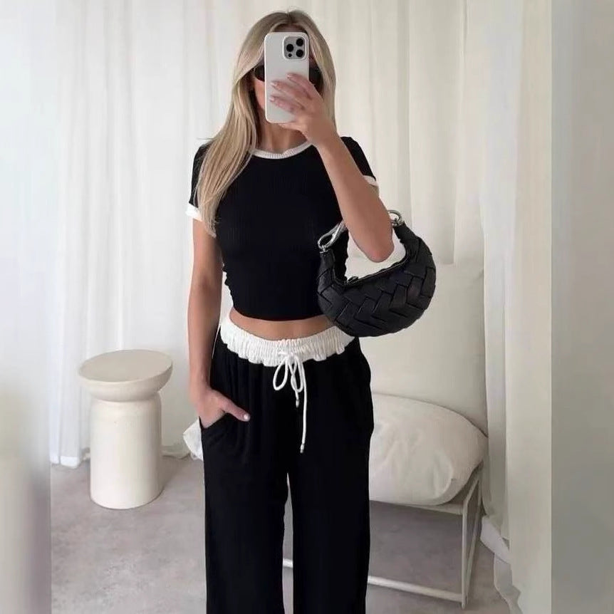 Kvindernes loungewear sæt med cropped top og brede bukser