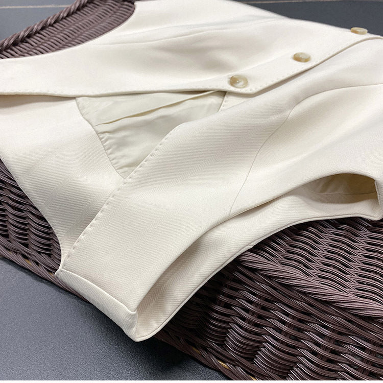 Dame elegant vest med fine guldknapdetaljer Stilla
