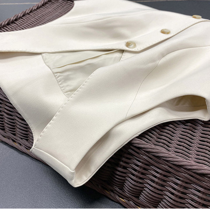 Dame elegant vest med fine guldknapdetaljer Stilla