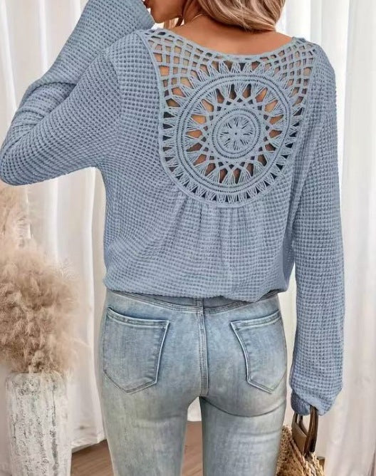Dame afslappet strikbluse med unikt hækle-detail Stilla