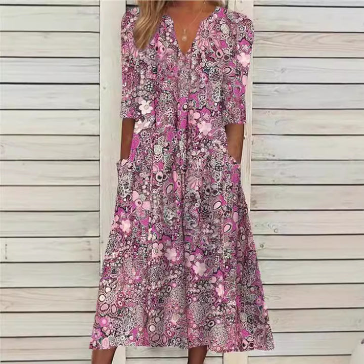 Dame maxikjole med blomster mønstre og praktiske sidelommer Stilla