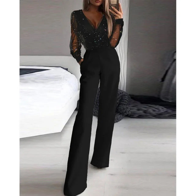 Kvinder Elegant Jumpsuit med Transparent Bluse og Glitrende Akcenter Skovae