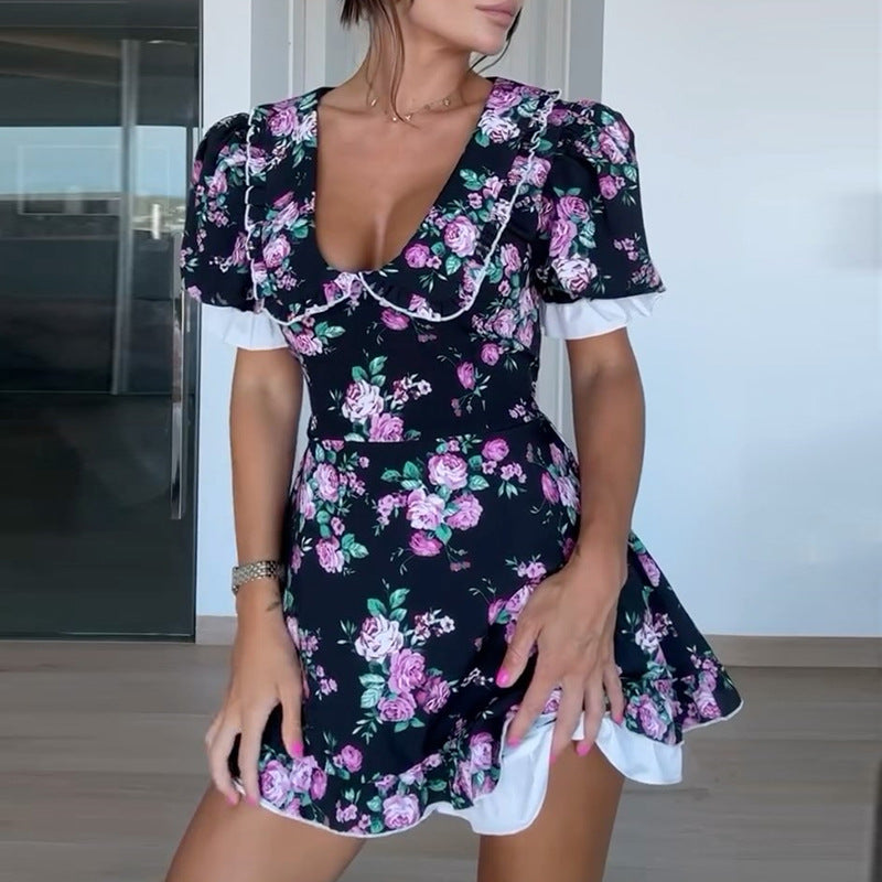 Damer legende blomsterkjole med voluminøse puffærmer og flæsedetaljer Stilla