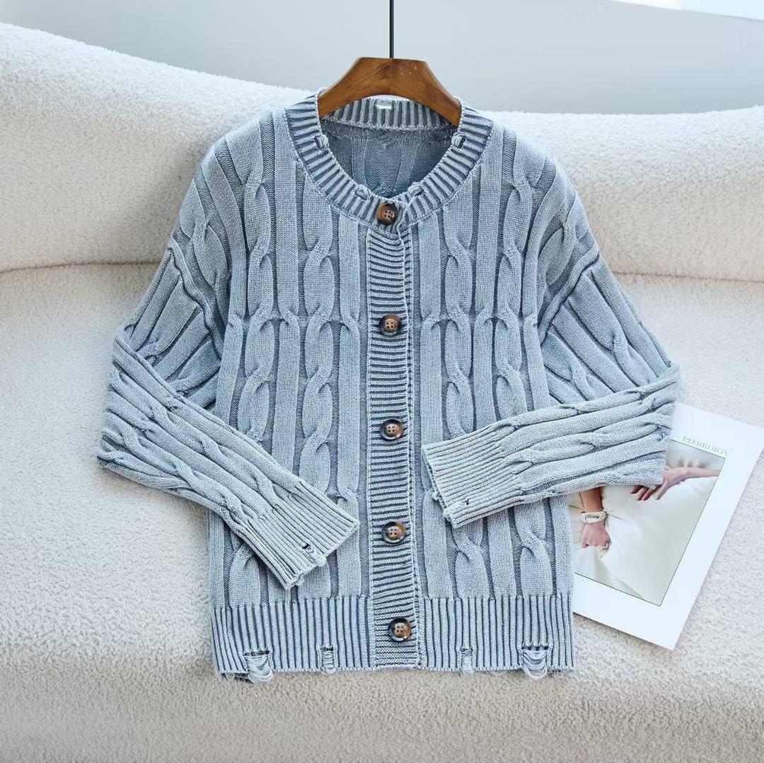 Kvinders cardigan med kabelmønster og knaplukning Stilla