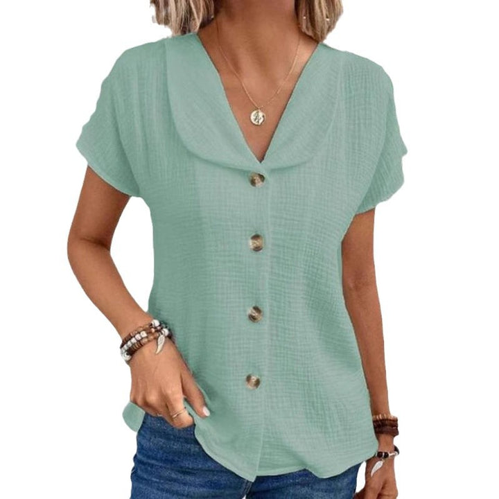 Damebluse med synlige knapper lavet af let stof Stilla