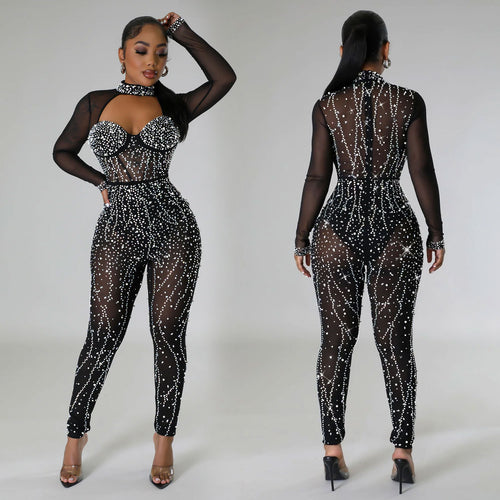 Dame Glamourøs Jumpsuit med gennemsigtigt overmateriale og funklerende strassdekorationer Stilla