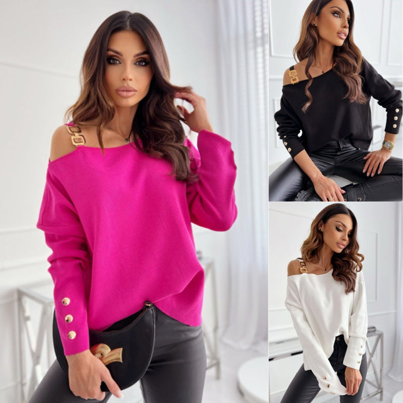 Dame afslappet striktrøje med off-shoulder design og dekorative knapdetaljer Stilla
