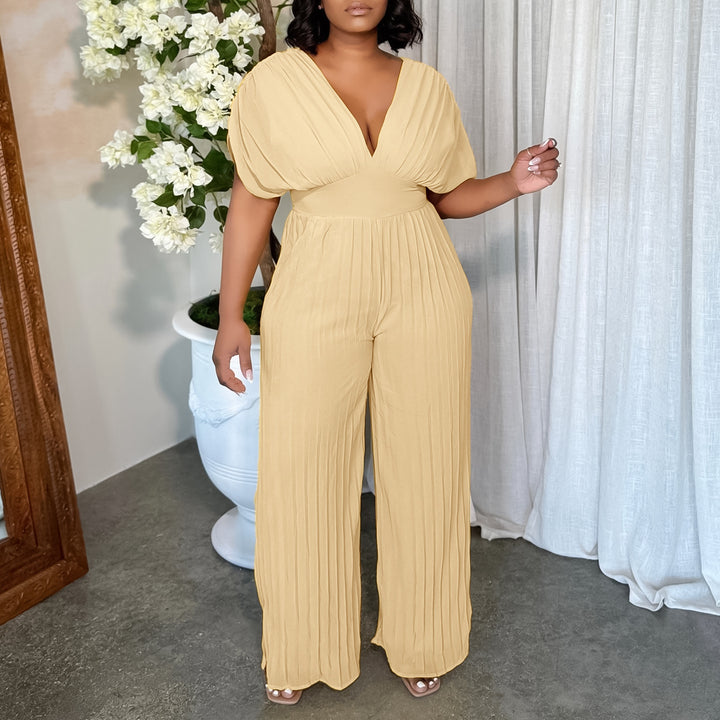 Dame Elegant Plisseret Jumpsuit med dyb V-udskæring og brede ærmer Stilla