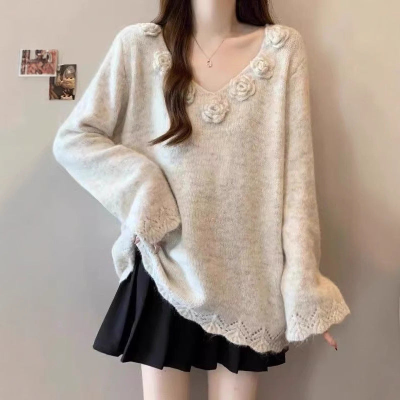 Kvinders store strikket sweater med blomsterapplikationer Stilla