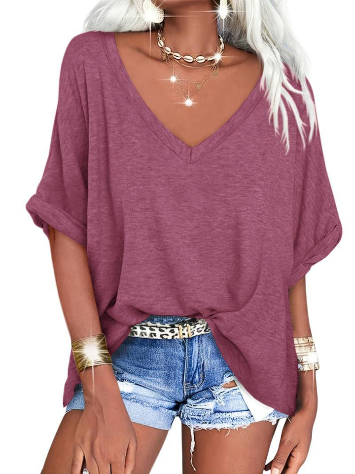 Dame afslappet V-hals T-shirt med oversized snit og plisseret detalje Stilla