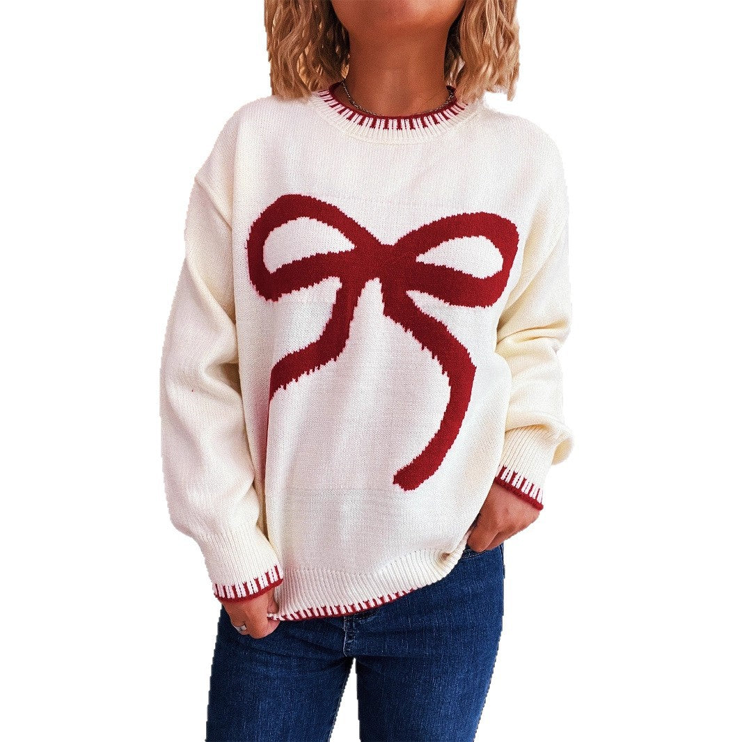Dame sweater med legende designet sløjfe applikation og moderne snit Stilla