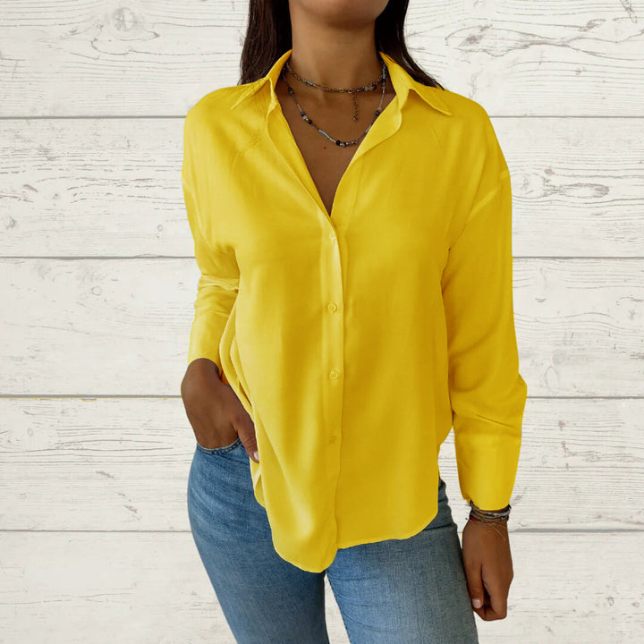 Dame moderne bluse med skinnende stof Stilla
