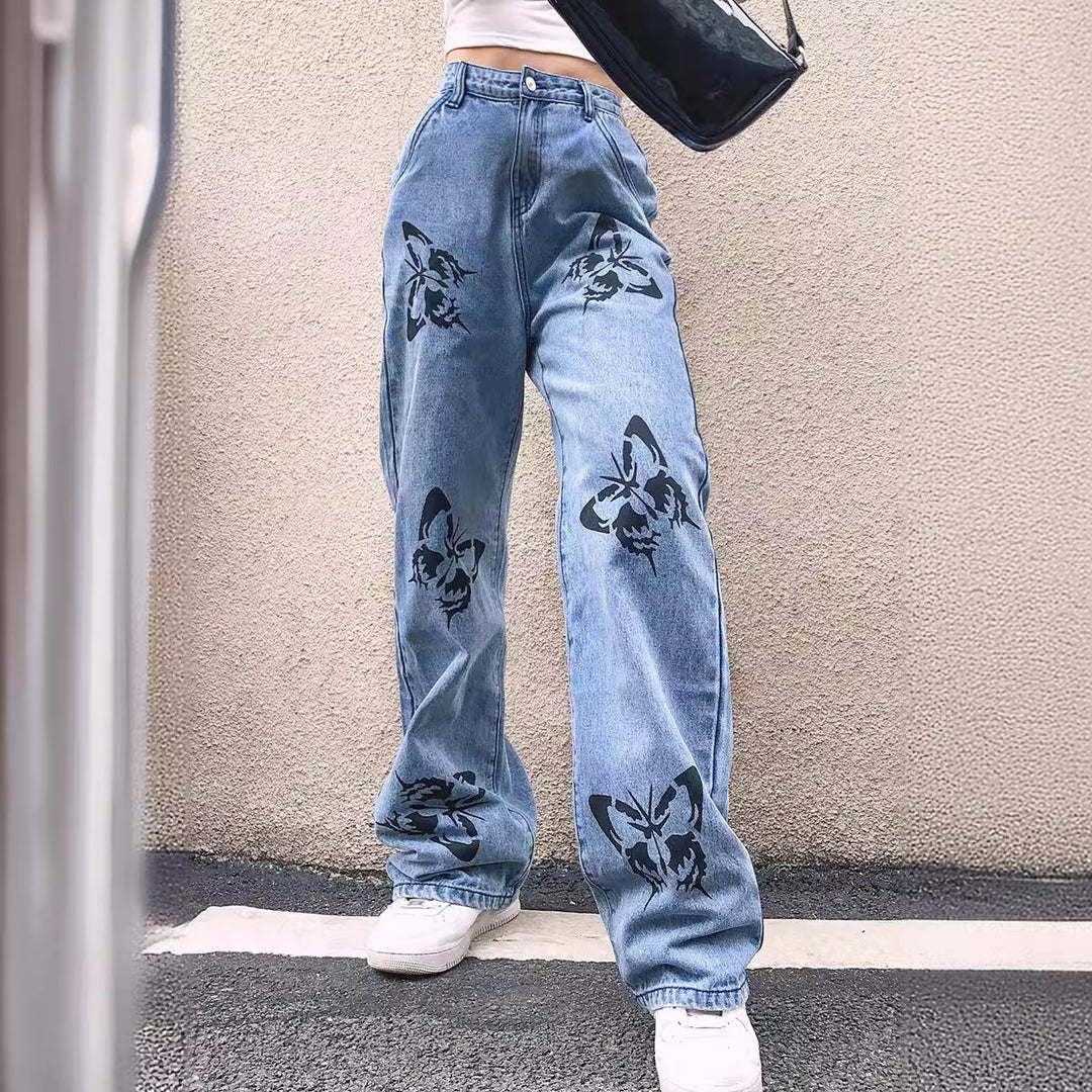 Dame brede jeans med iøjnefaldende sommerfugletryk Skovae