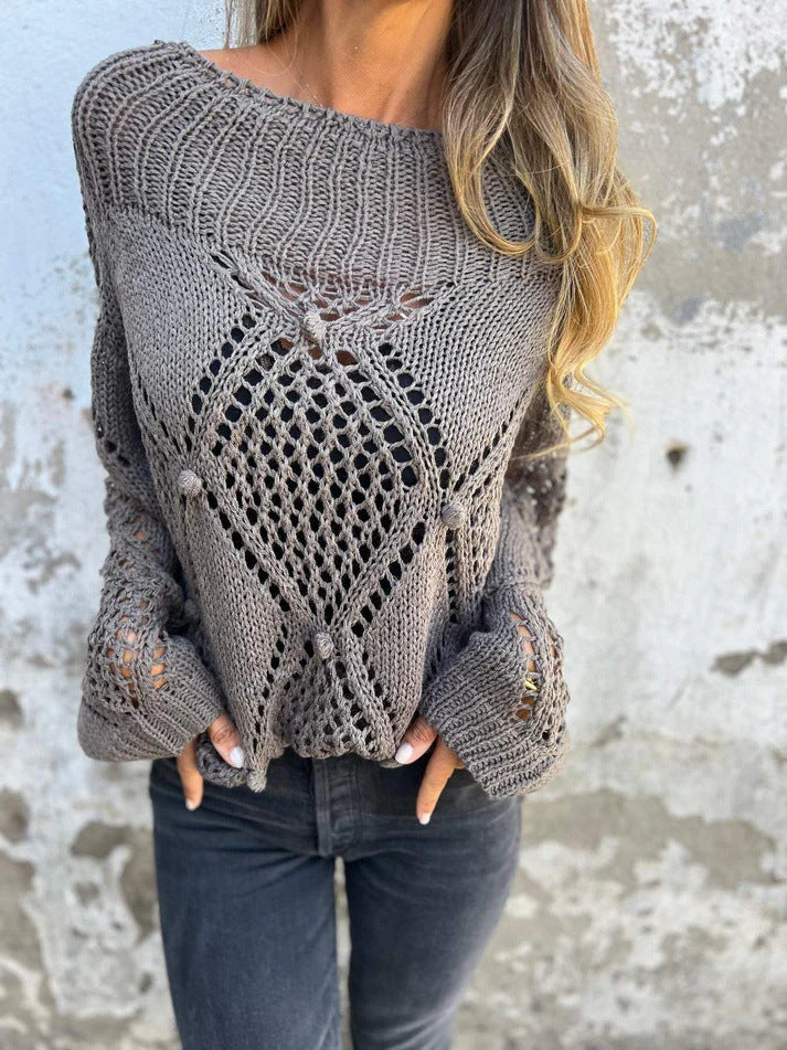 Damer let strikket pullover med unikt hulmønster Stilla