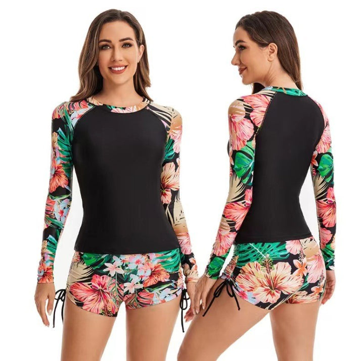 Dame Rashguard-sæt med stribede ærmer og blomsterdesign Stilla