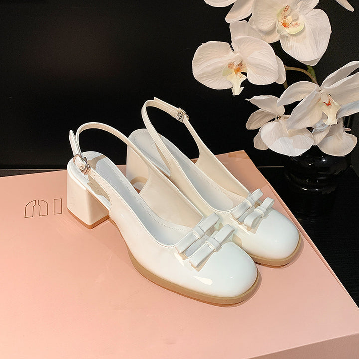 Dame Sling-pumps med elegant sløjfedekoration og komfortabel blokhæle Stilla