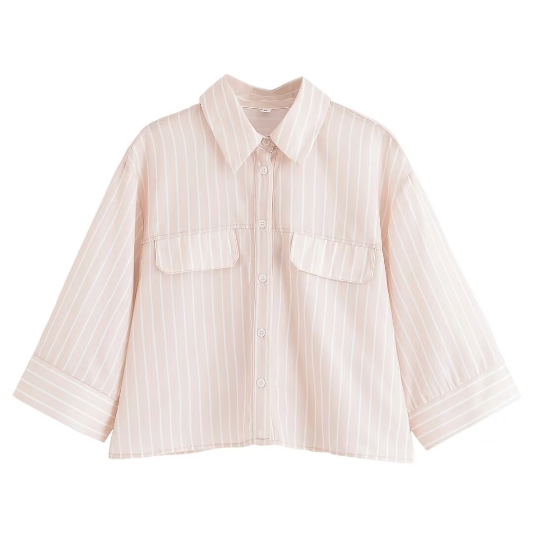 Dame stribet bluse med oversized pasform og praktiske lommer Stilla