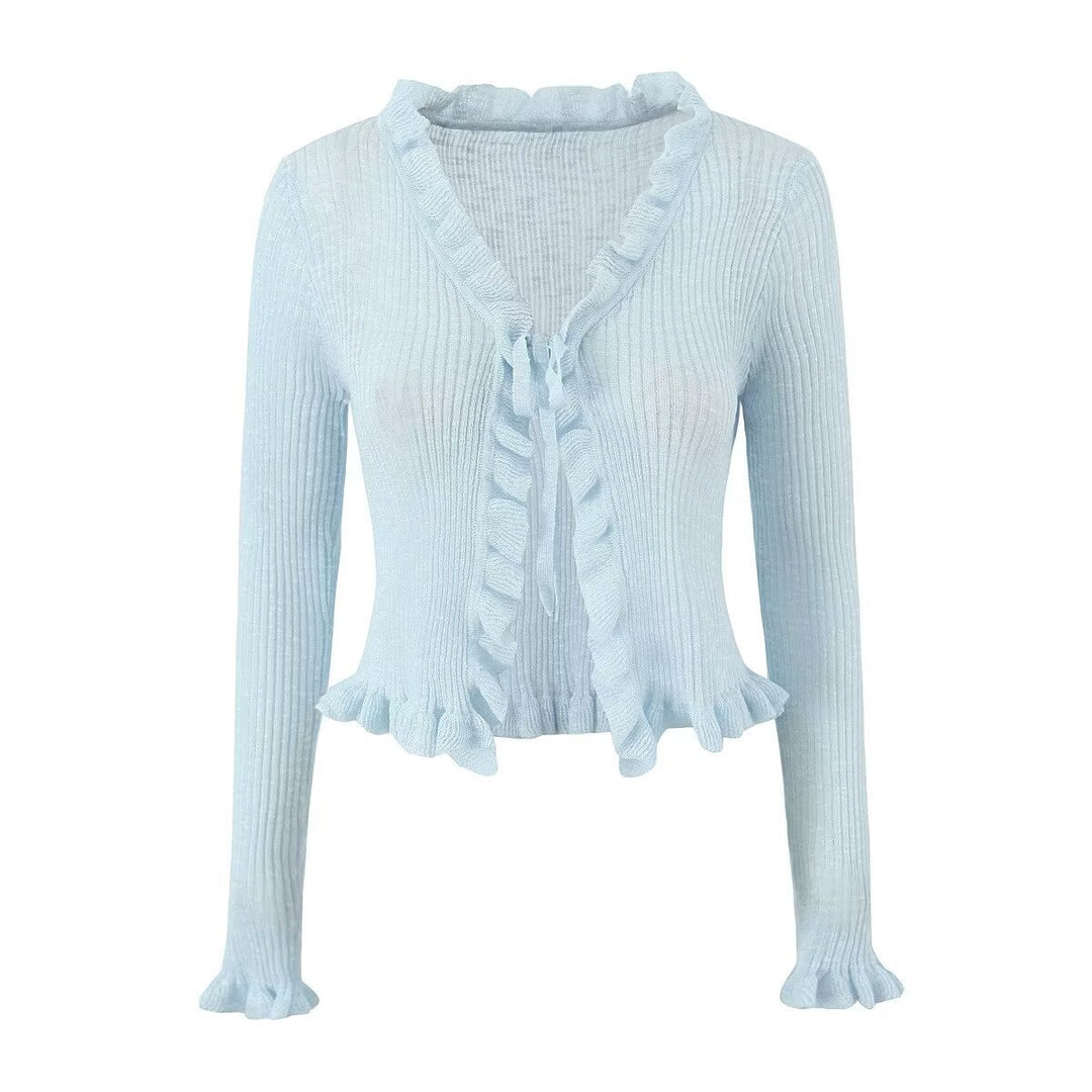 Dame ribstrikjakke med fine ruffles detaljer og afslappet snit Stilla