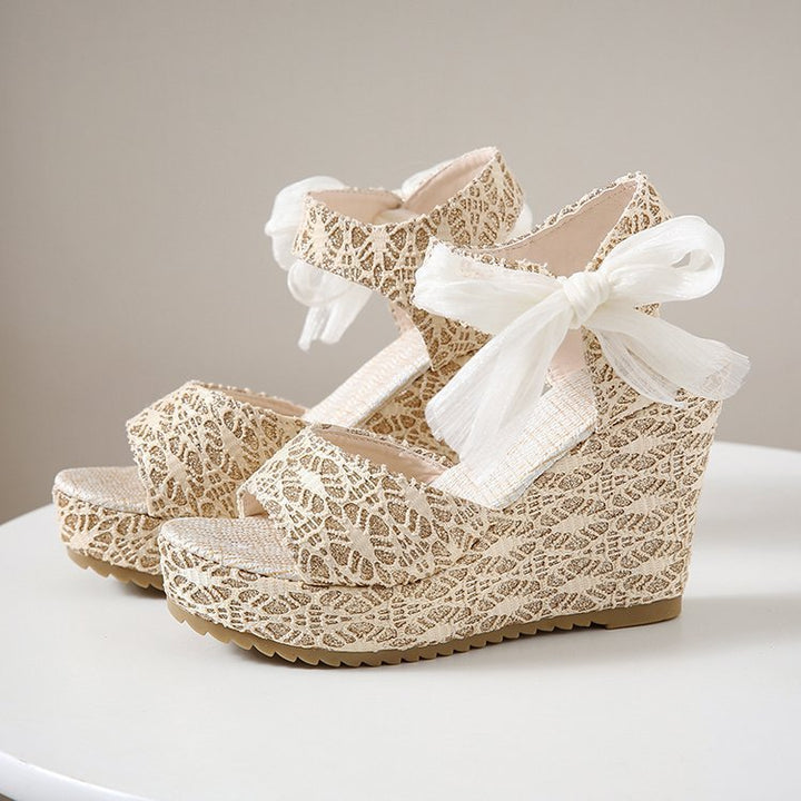 Dame nan romantisk kilehælsandalette med spidse detaljer og organza-sløjfe Skovae