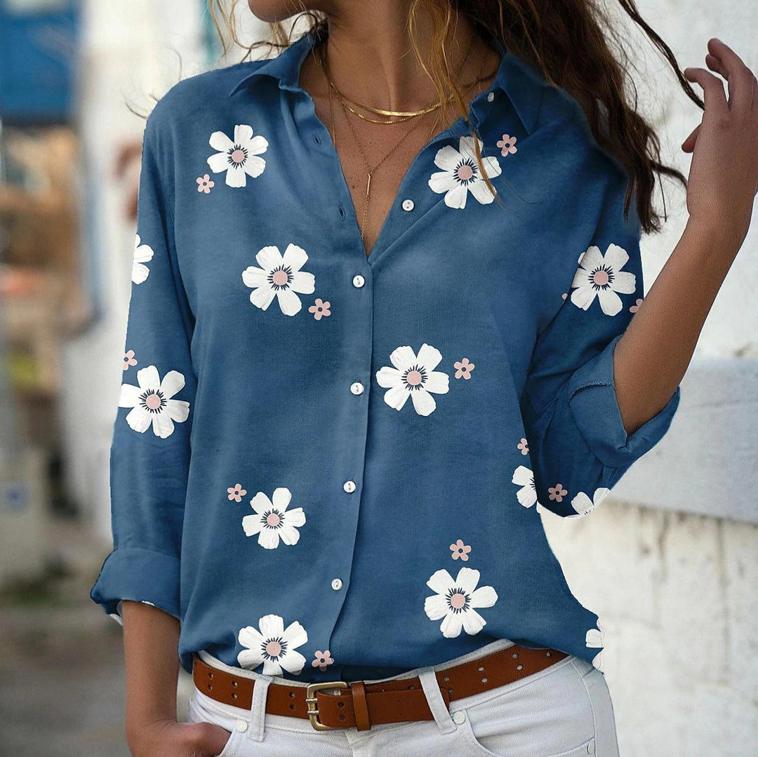 Damebluse med blomsterdesign og elegant krave Stilla