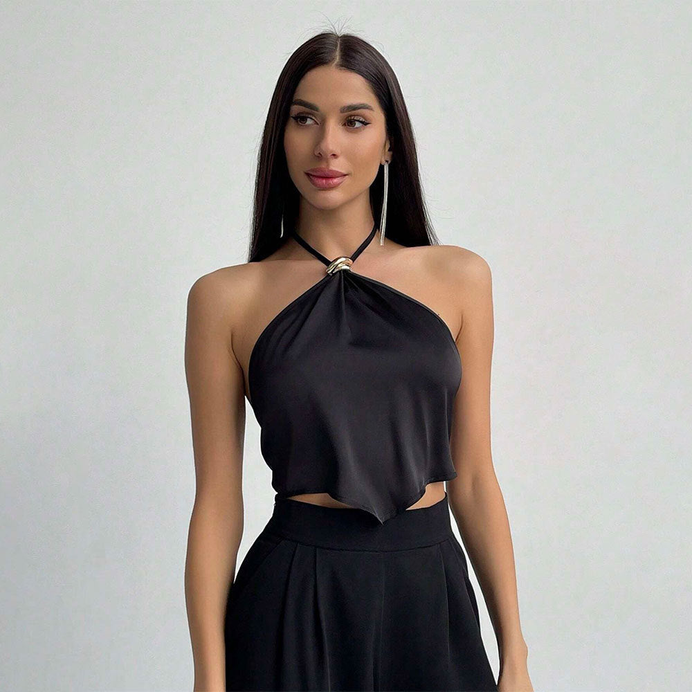 Dames elegant halterneck top med shiny stof og dekorativ knude Stilla