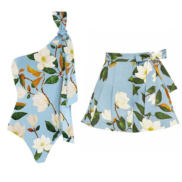 Dame heldragt badedragt med blomsteret indpakningsnederdel og moderne one-shoulder-design Stilla