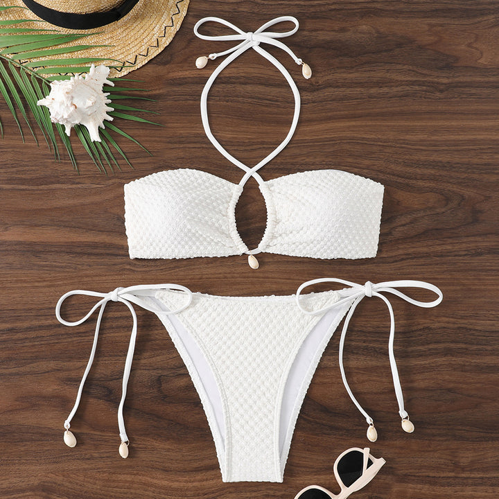 Dame bikini-sæt med innovativt bindemønster og trendy cut-out skovae