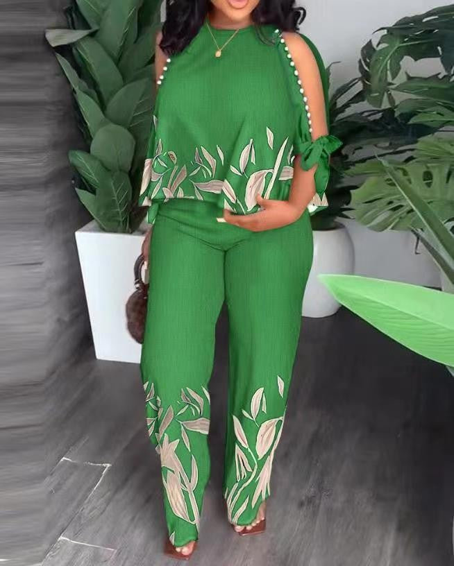 Dame Elegant designet sommeroutfit med blomstermønster og skulderfri overdel Skovae