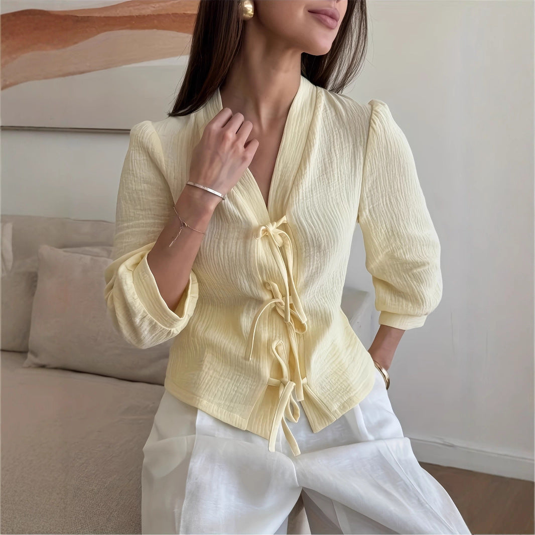 Dame stilfuld bluse med bindingsbånd og struktureret design Stilla