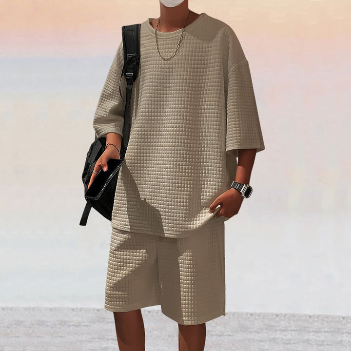 Herrer nan kvadratstruktur fritidsæt med oversized rundhalstrøje og knælange afslapningsshorts Skovae