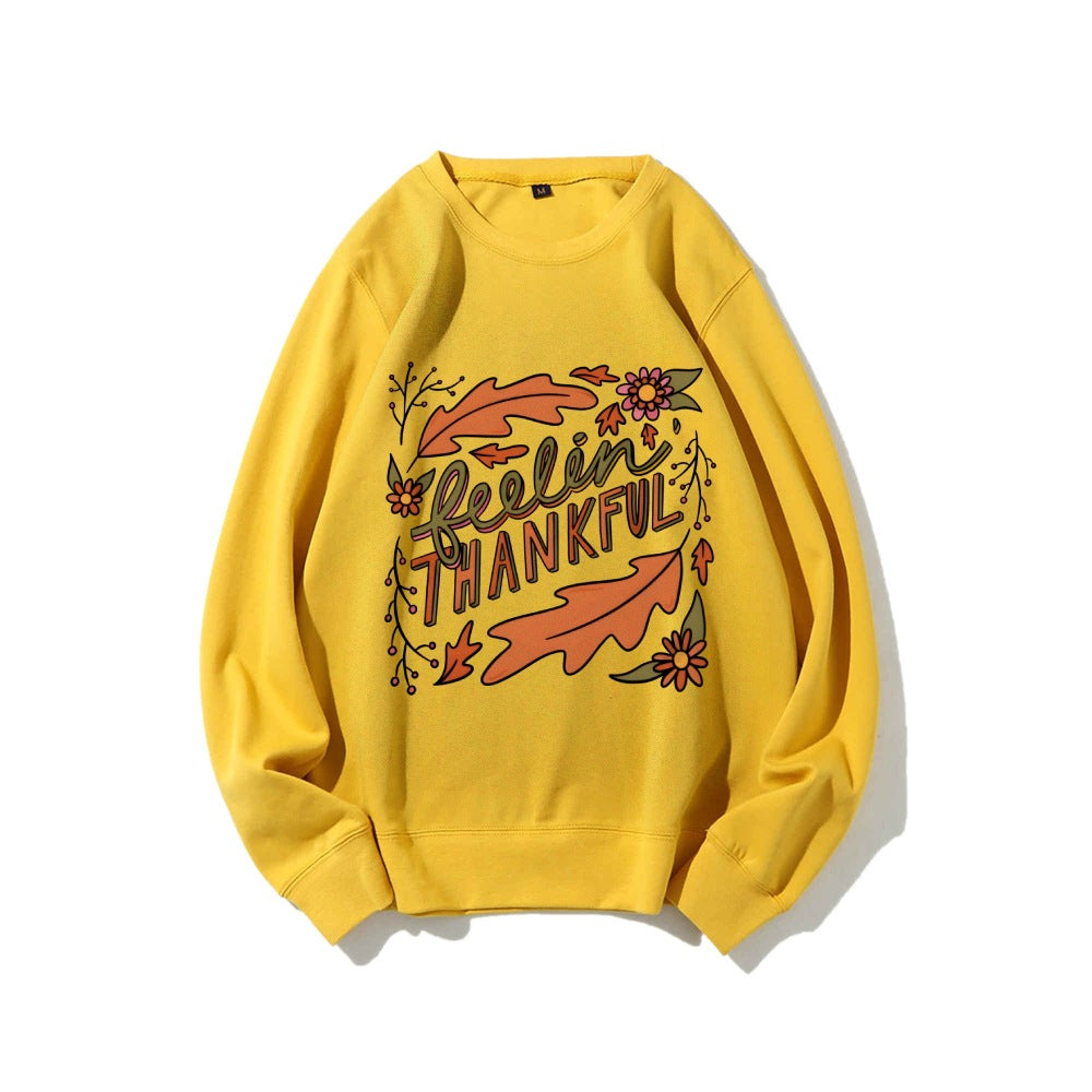Kvinders sweatshirt med farverigt efterårsdesign og inspirerende tekst Stilla